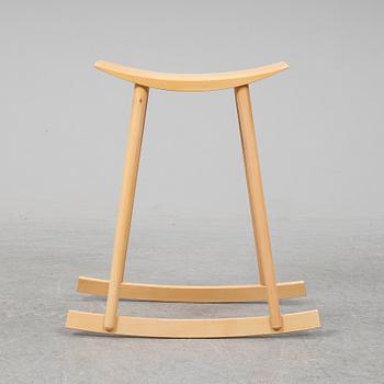 PER SUNDSTEDT, a wood rocking stool from Pyra.