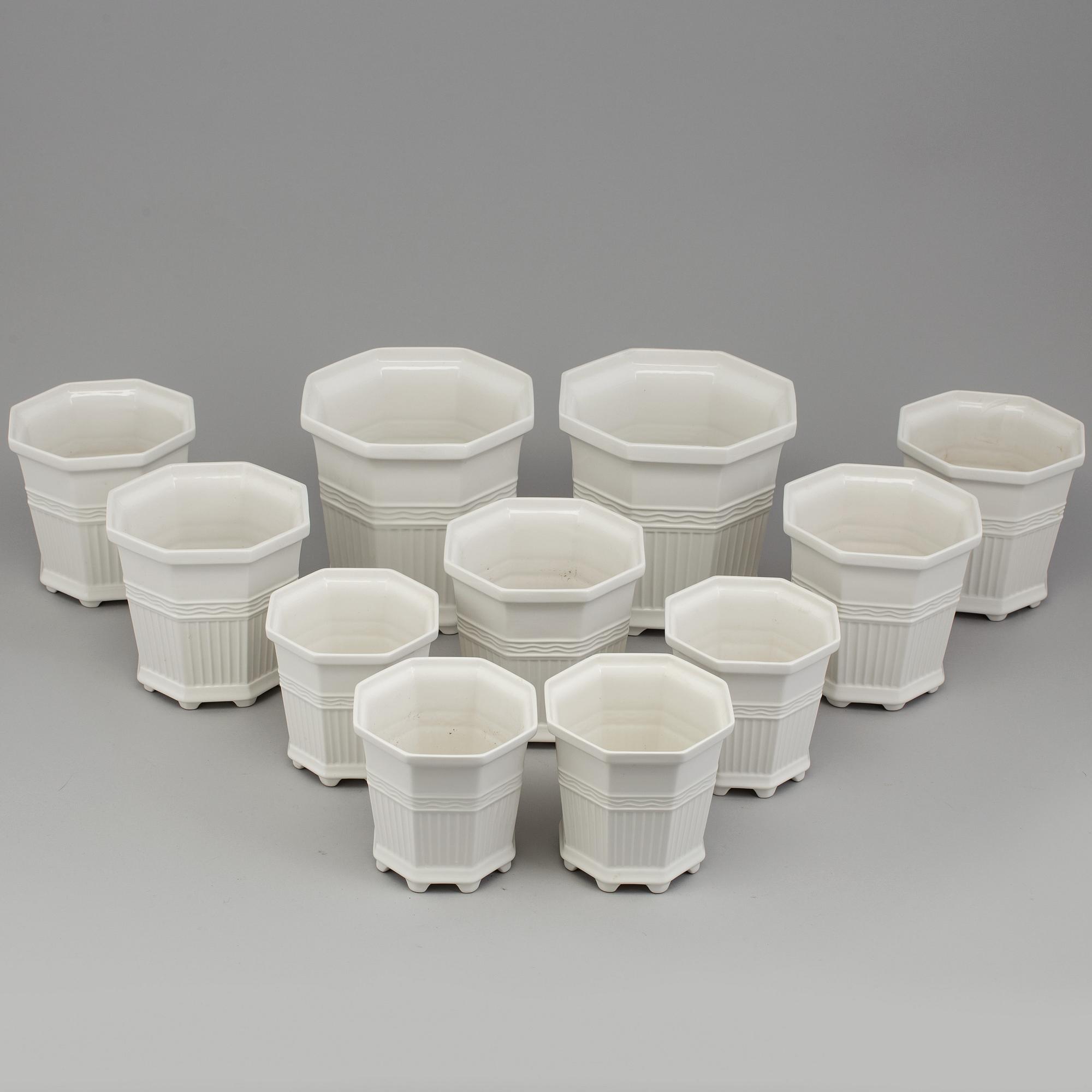 Eleven Swedish porcelain plant pots, Prins Eugen, 'Waldemarsudde', Rörstrand.