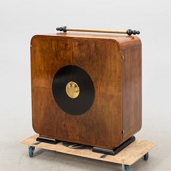 A walnut veneered Art Déco cabinet.