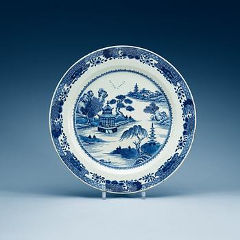 1587. A blue and white charger, Qing dynasty, Qianlong (1736-95).