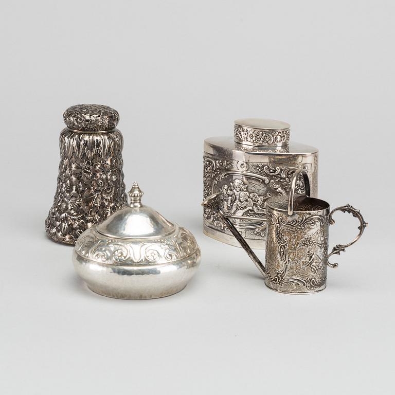 A set of four different silver objects, different makers and origin, silver, weight ca 442 gr.