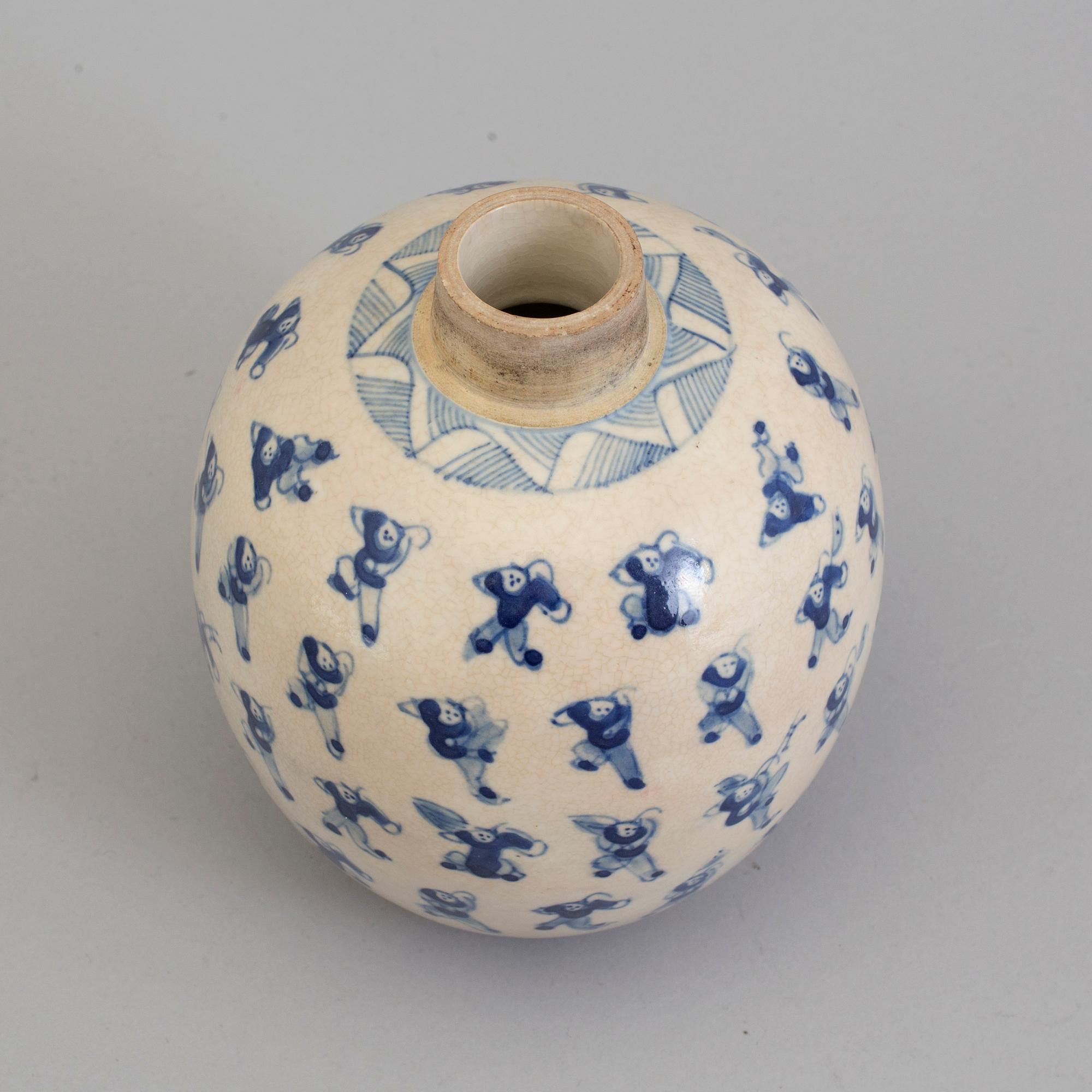 A blue and white porcelain jar, circa 1900.