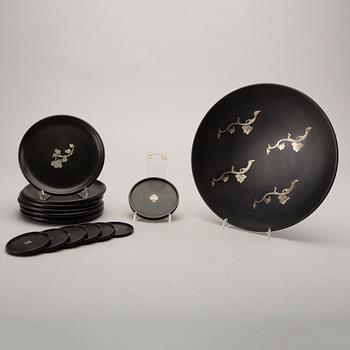 A Swedish 20th century set of 14 plates in bakelite and silver mark of T Wendt Helsingborg 1945.