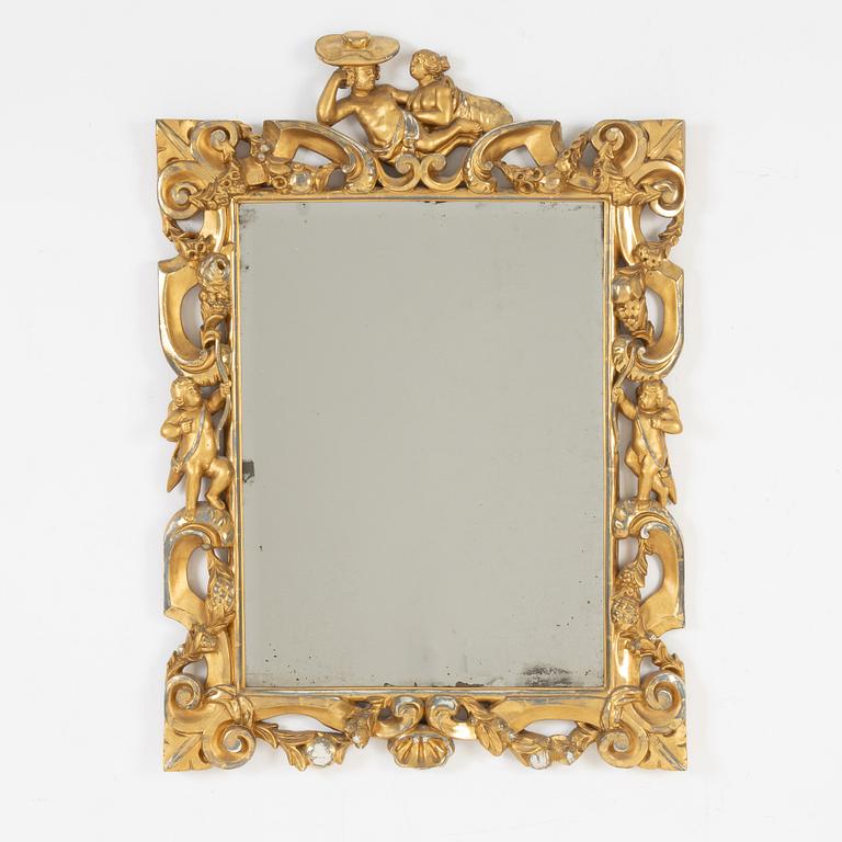 A gilt Baroque style mirror, circa 1900.