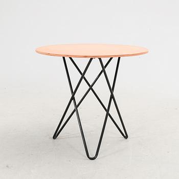 A 2022 leather top table 'O table' by Dennis Marquat for OX Denmarq.