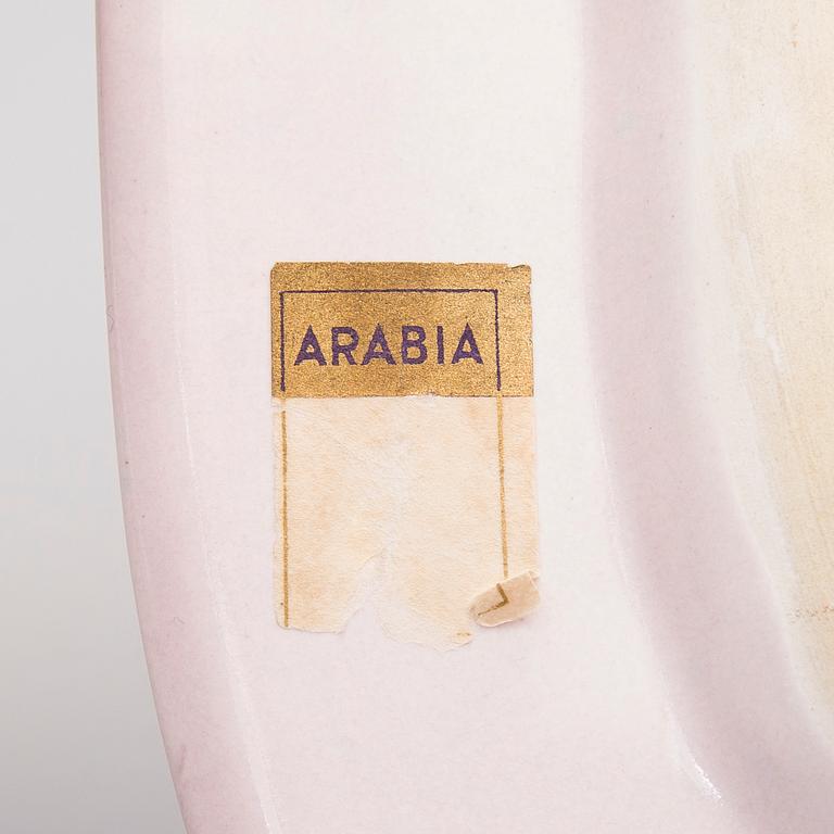 A ceramic plate signed Bryk Arabia.