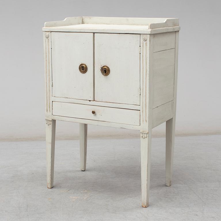 A later part of the 19th century Gustavian style bedside cabinet.