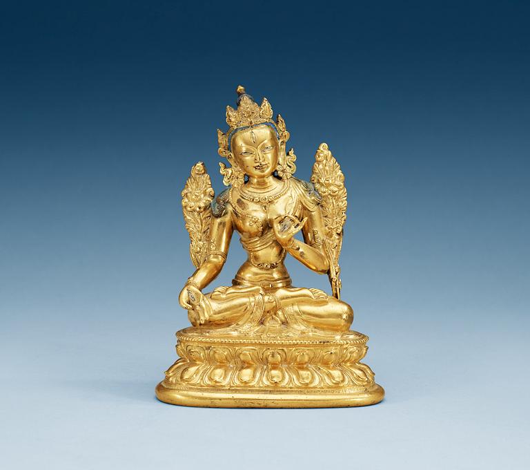 A gilt bronze Sino-Tibetan figure of White Tara, 19th Century.