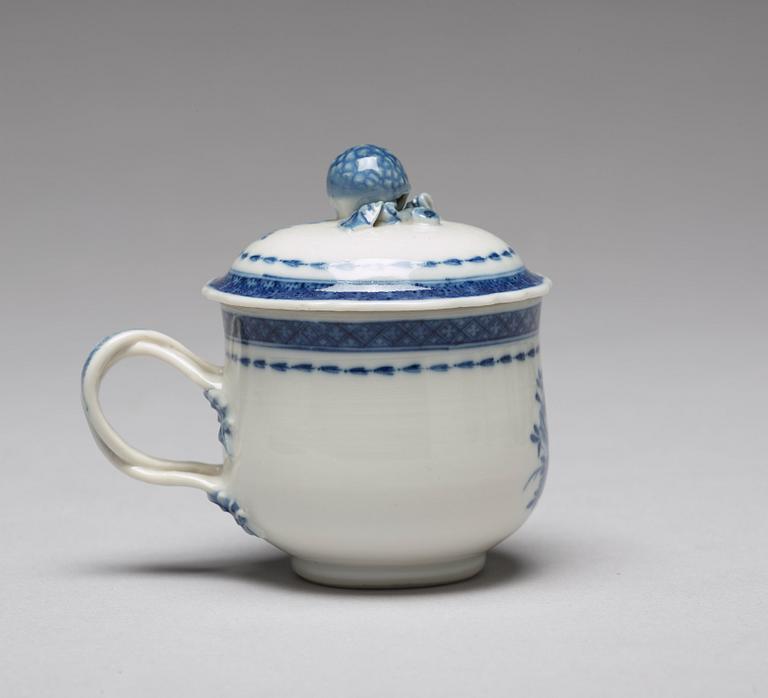 A set of nine blue and white custard cups with covers and a tray, Qing dynasty, Jiaqing (1796-1820).