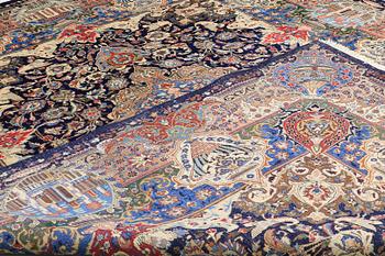 A carpet, Figural Kashmar, ca 407 x 305 cm.