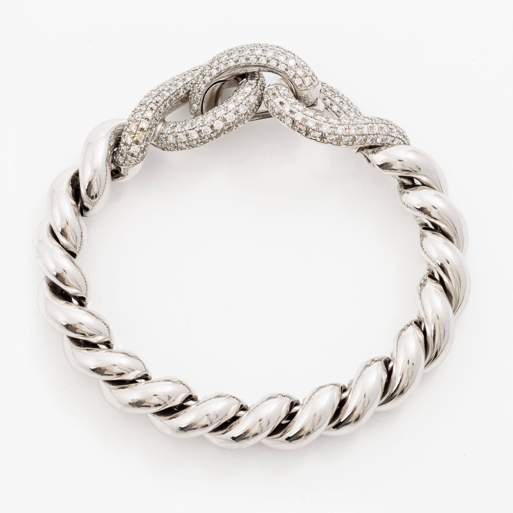 Hermès a bracelet 18K white gold with round brilliant-cut diamonds.
