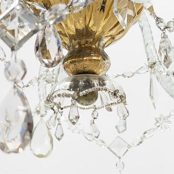 A European glass three-light chandelier, circa 1800.