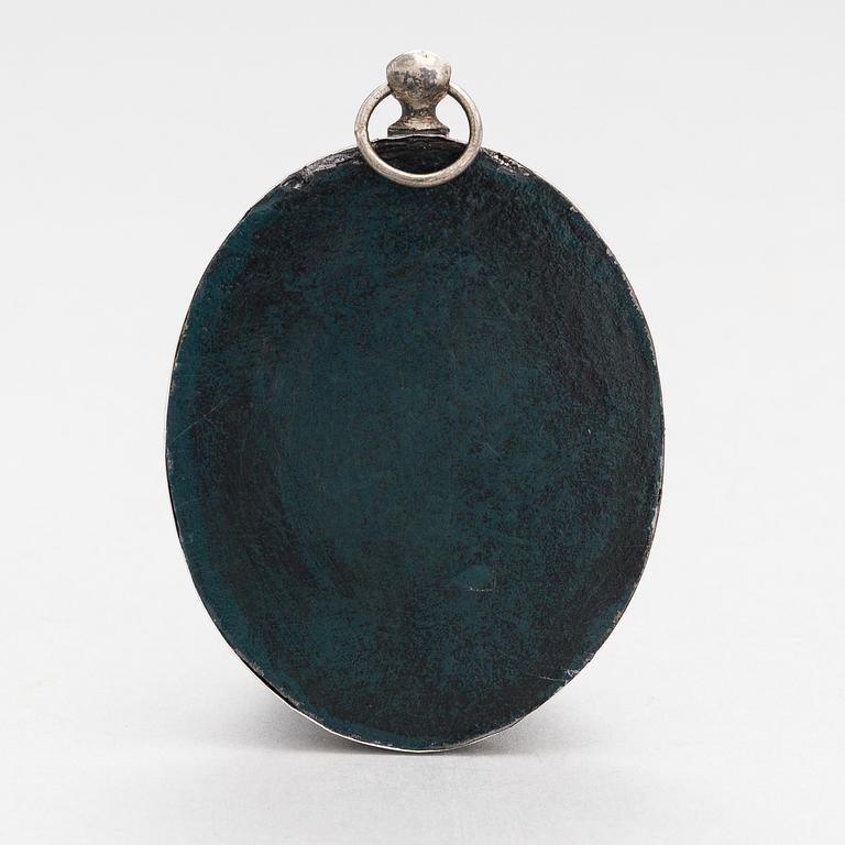 A silver and mother-of-pearl icon, Russian import mark, Moscow 1908-17.