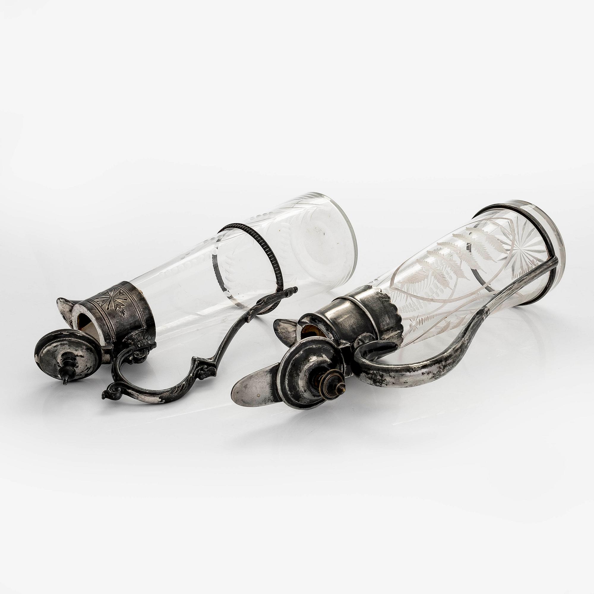 Two wine pitches, around 1900.