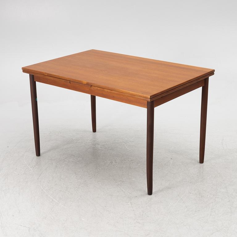 A dining table, 1950s/60s.