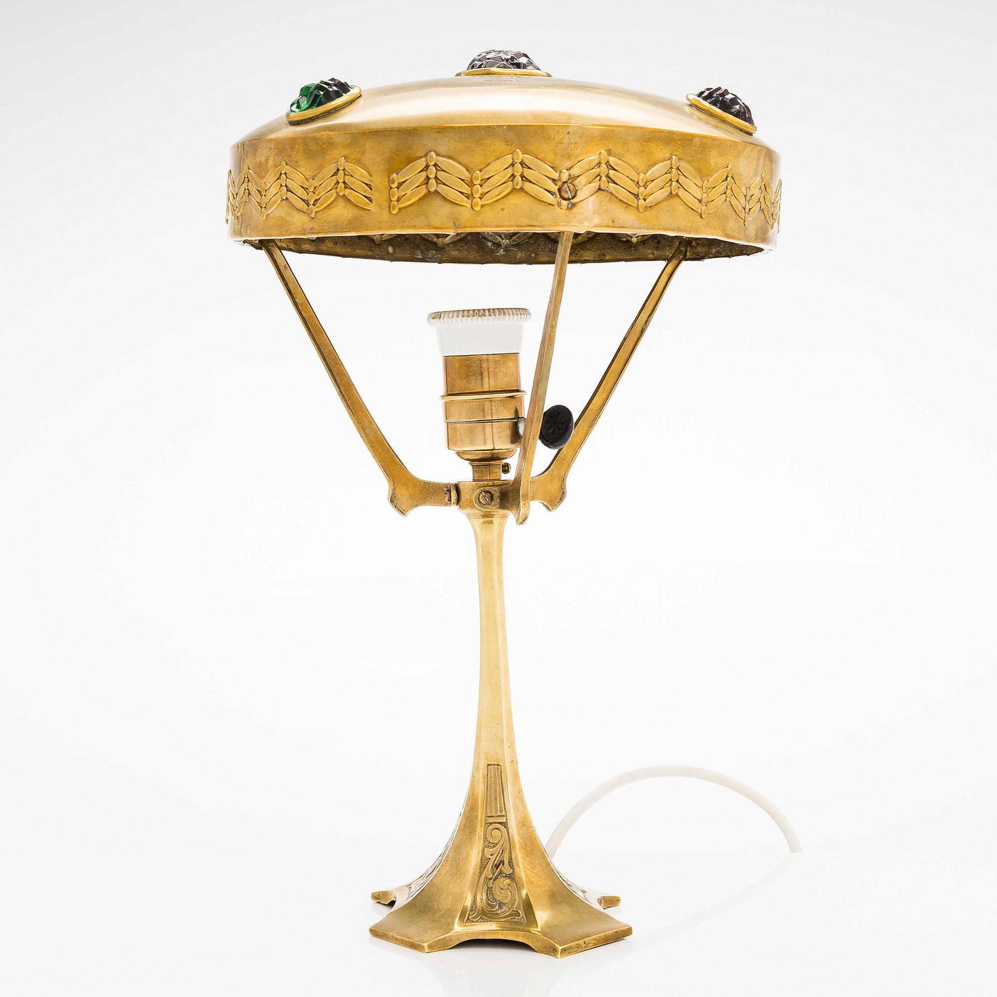 A brass table lamp, first half of the 20th century.