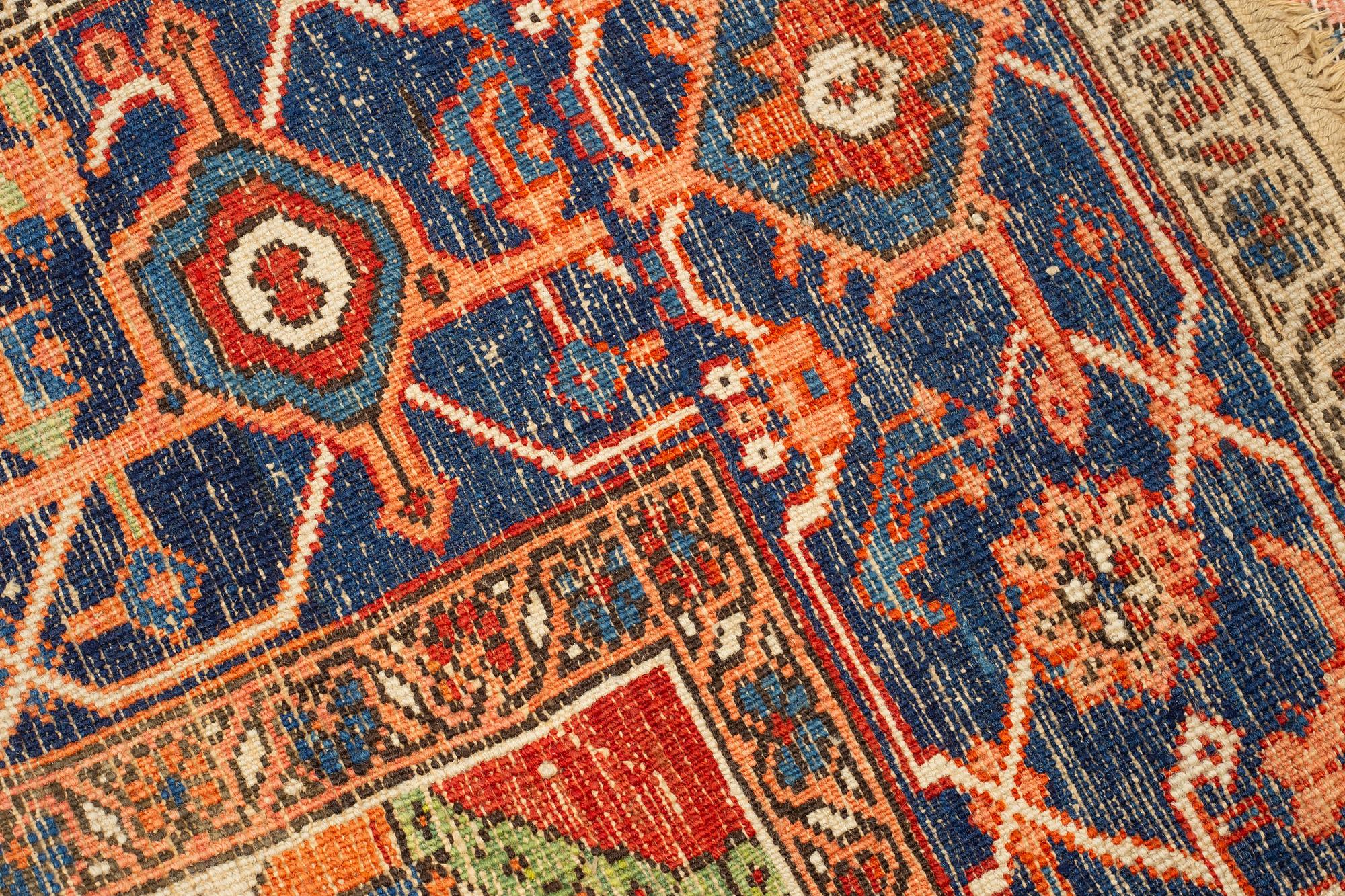 A carpet, an antique Heriz, ca 469,5-471 x 300-309,5 cm.