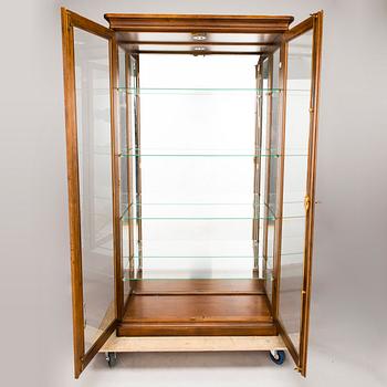 A late 20th century display cabinet.