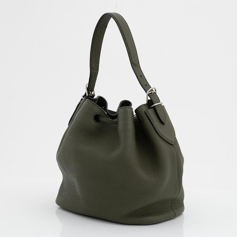 Bally, a gree leather handbag.