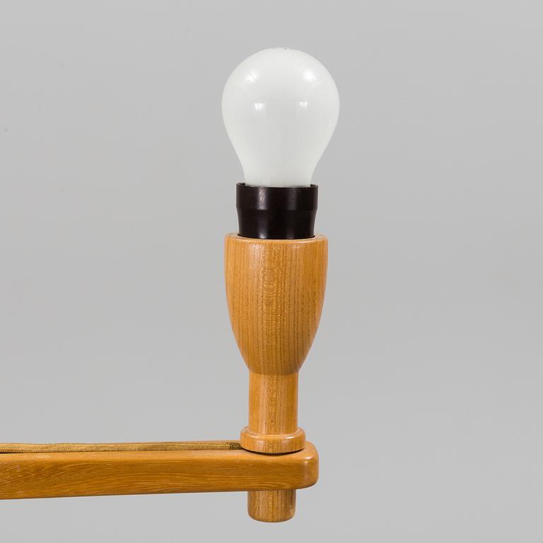 CARL MALMSTEN, a 'Staken' teak standard light.