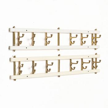 Coat hangers, a pair, “Dekorativ”, Skoglunds Metallgjuteri, Anderstorp, mid-20th century.