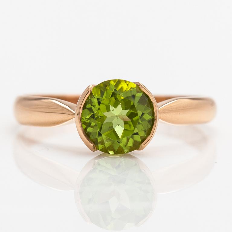 Ring, 18K guld och peridot. Kultateollisuus, Åbo 1917.