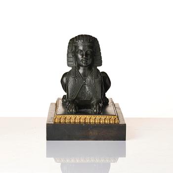 A French Empire bronze sfinx.