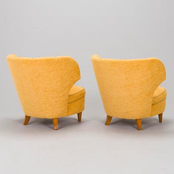A pair of armchairs, mid-20th century.