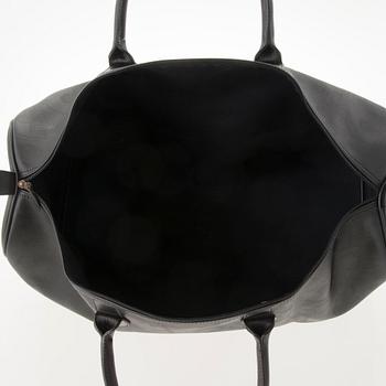 CHRISTIAN DIOR Black Monogram Coated Canvas Duffel Bag.