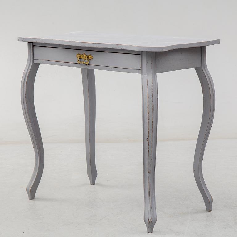 A circa 1900 Rococo style writing desk.