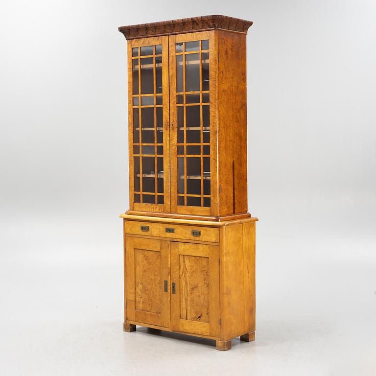 A birch wood veneered book cabinet early 20th Century.