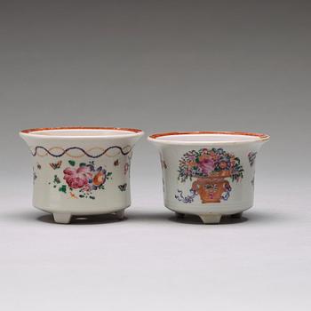 A set of four (2+2) famille rose flower pots with stands, Qing dynasty, Qianlong (1736-95).