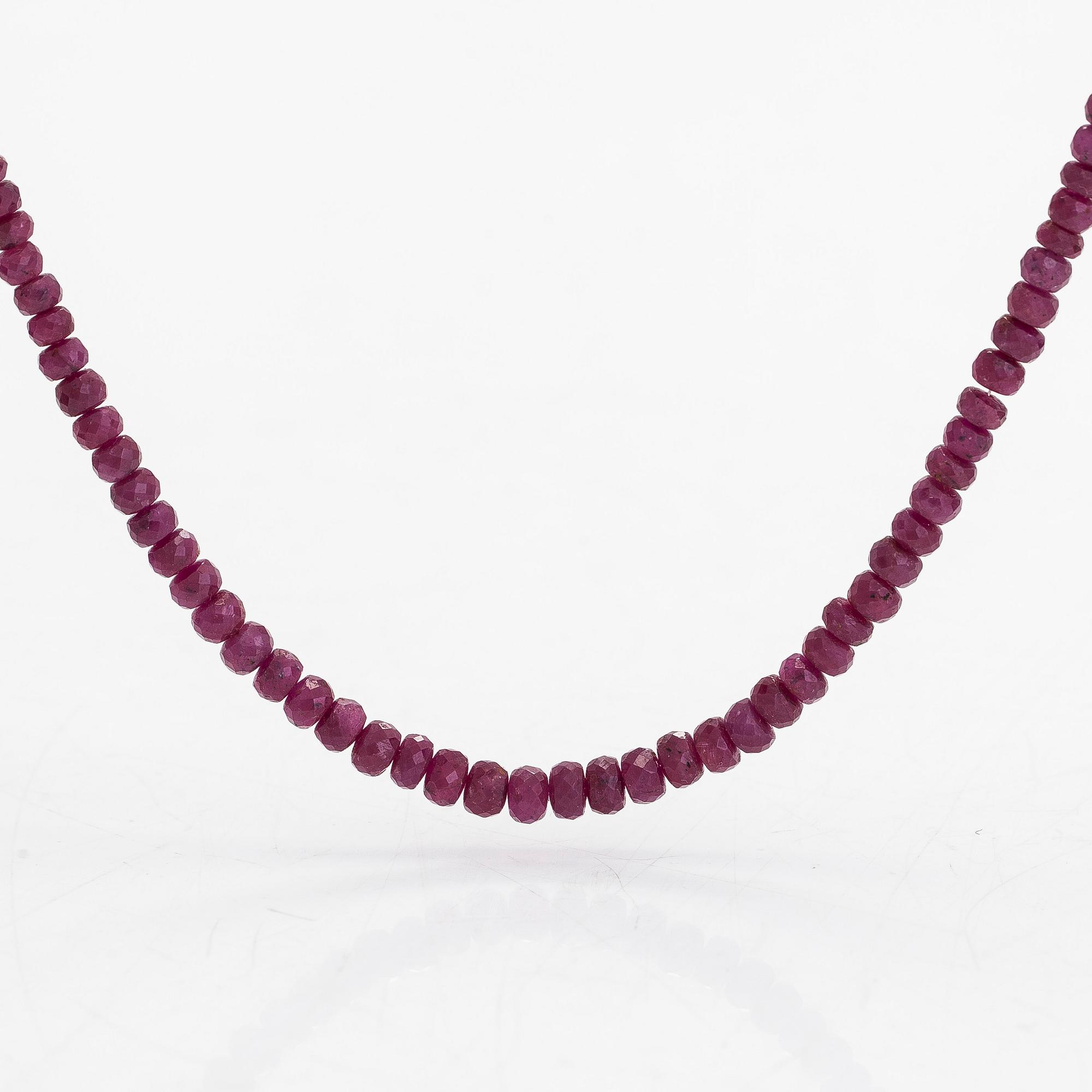 A necklace, set with rubies, clasp in 14K gold.
