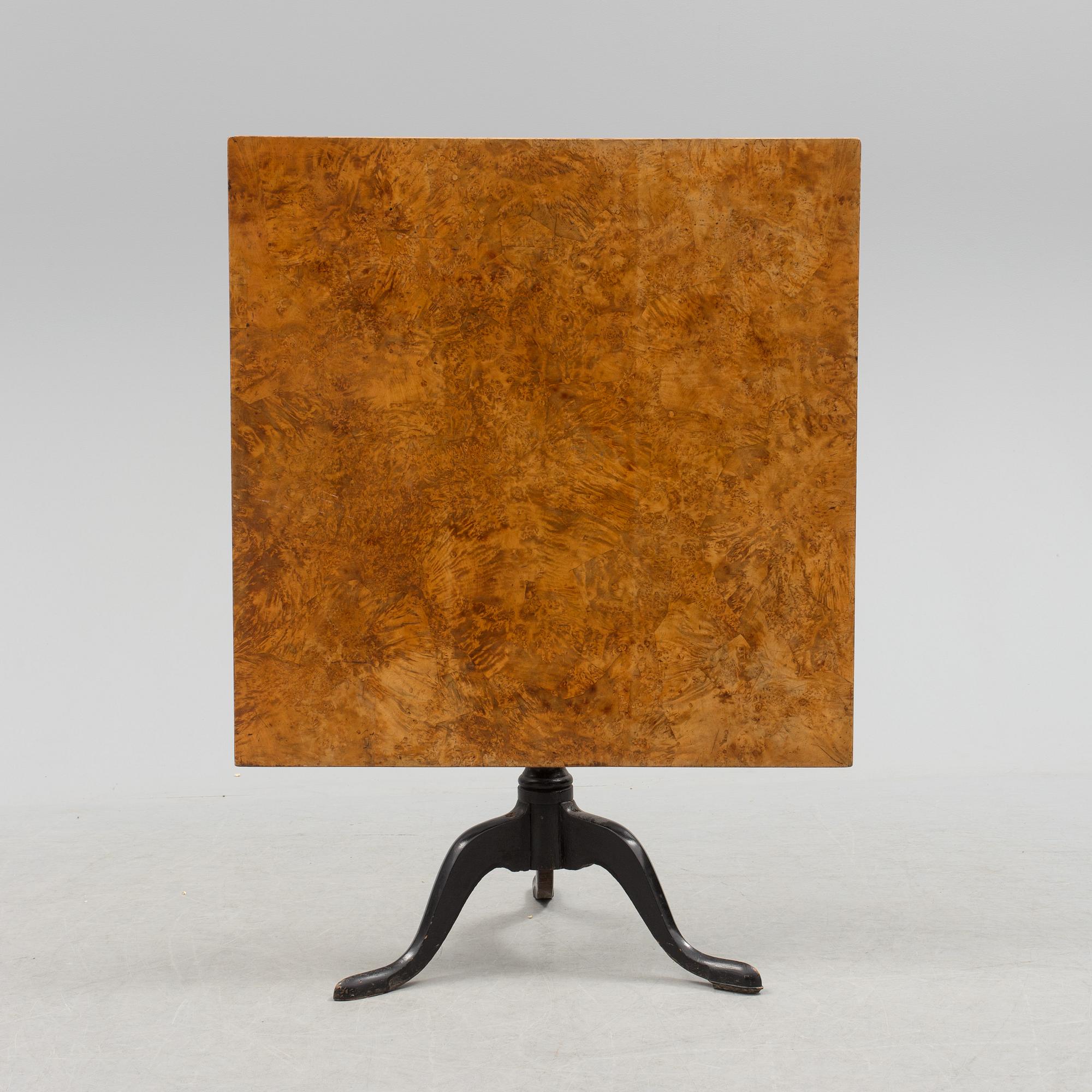 A 19th century folding table with root veneer.