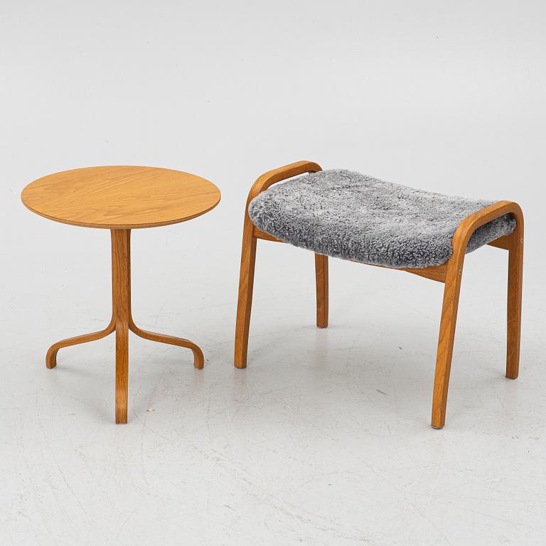 Yngve Ekström, A pair of armchairs, a footstool, “Lamino”, and a side table, Swedese, 2000s.