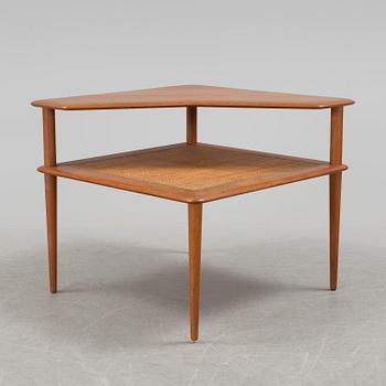 A teak table by Peter Hvidt & Orla Mølgaard Nielsen, France & Daverkosen.