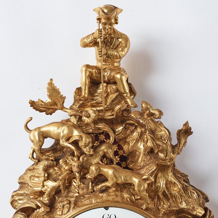 A Louis XV mid 18th century gilt bronze wall clock, "Chasse", in the style of J J de Saint Germain,