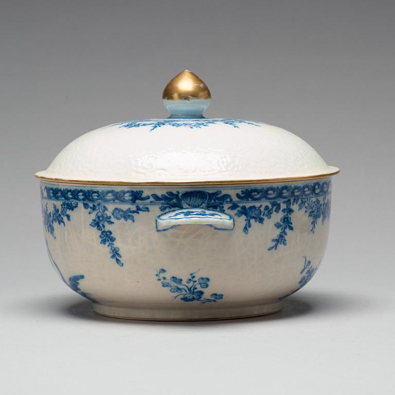 A blue and white armorial tureen with cover, and stand, Qing dynasty, 18th Century.