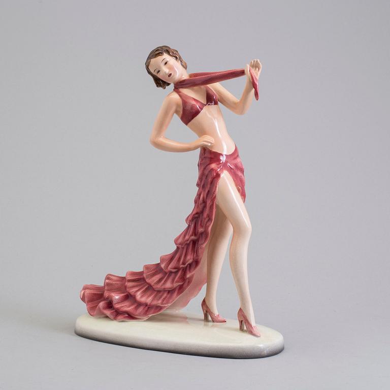 a creamware figurine by Stefan Dakon, Goldscheider, 1938.