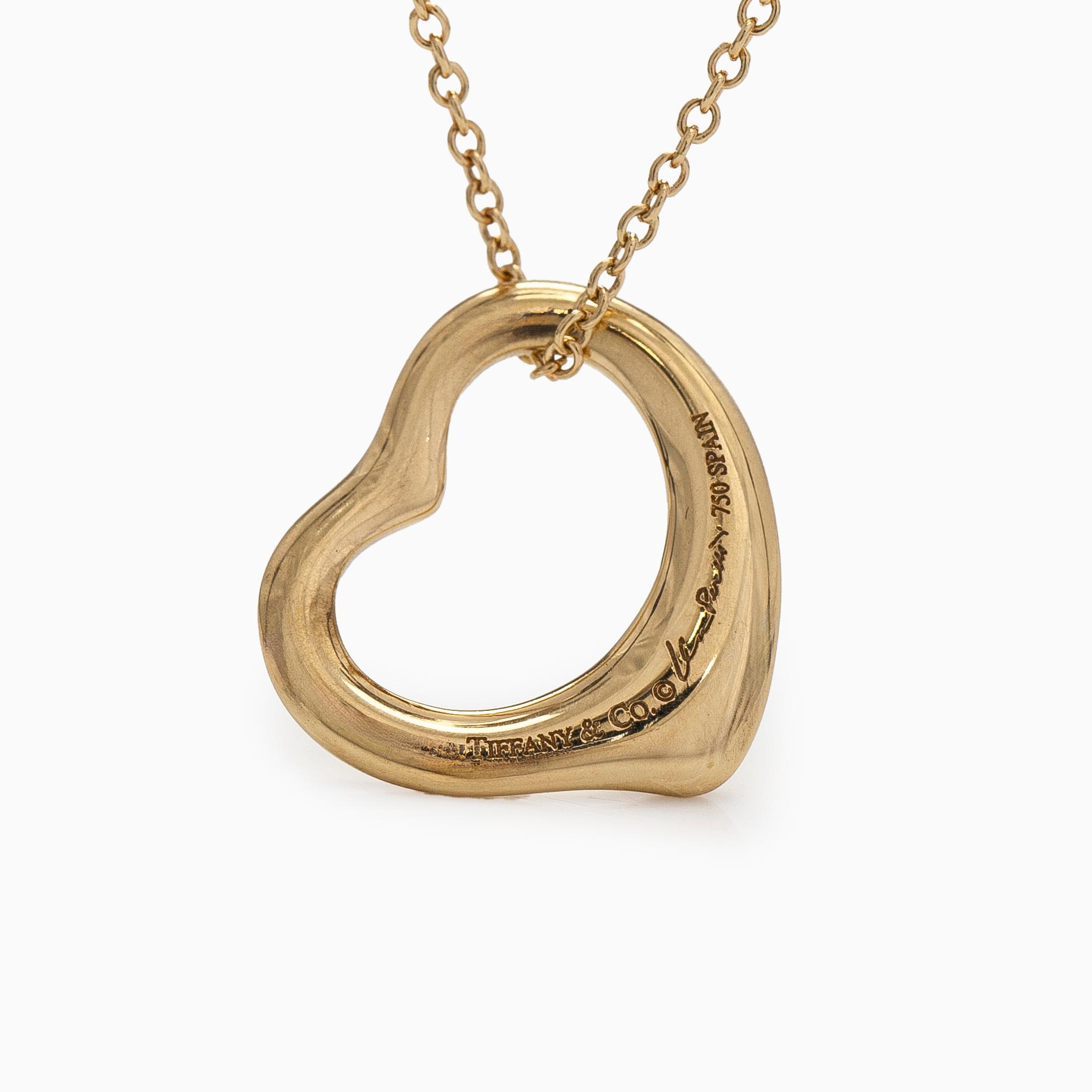 Tiffany & Co, Elsa Peretti, an 18K gold "Open Heart" necklace.