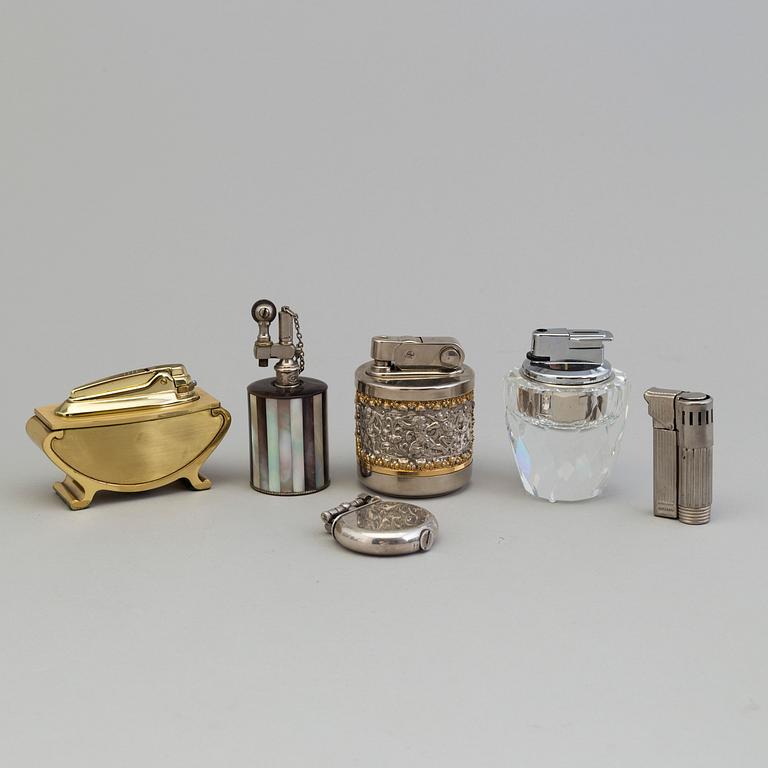 A set of six lighters, Ronson, Dunhill, among others.