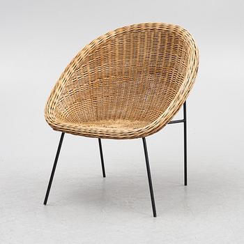 A cane armchair, mig 20th century.