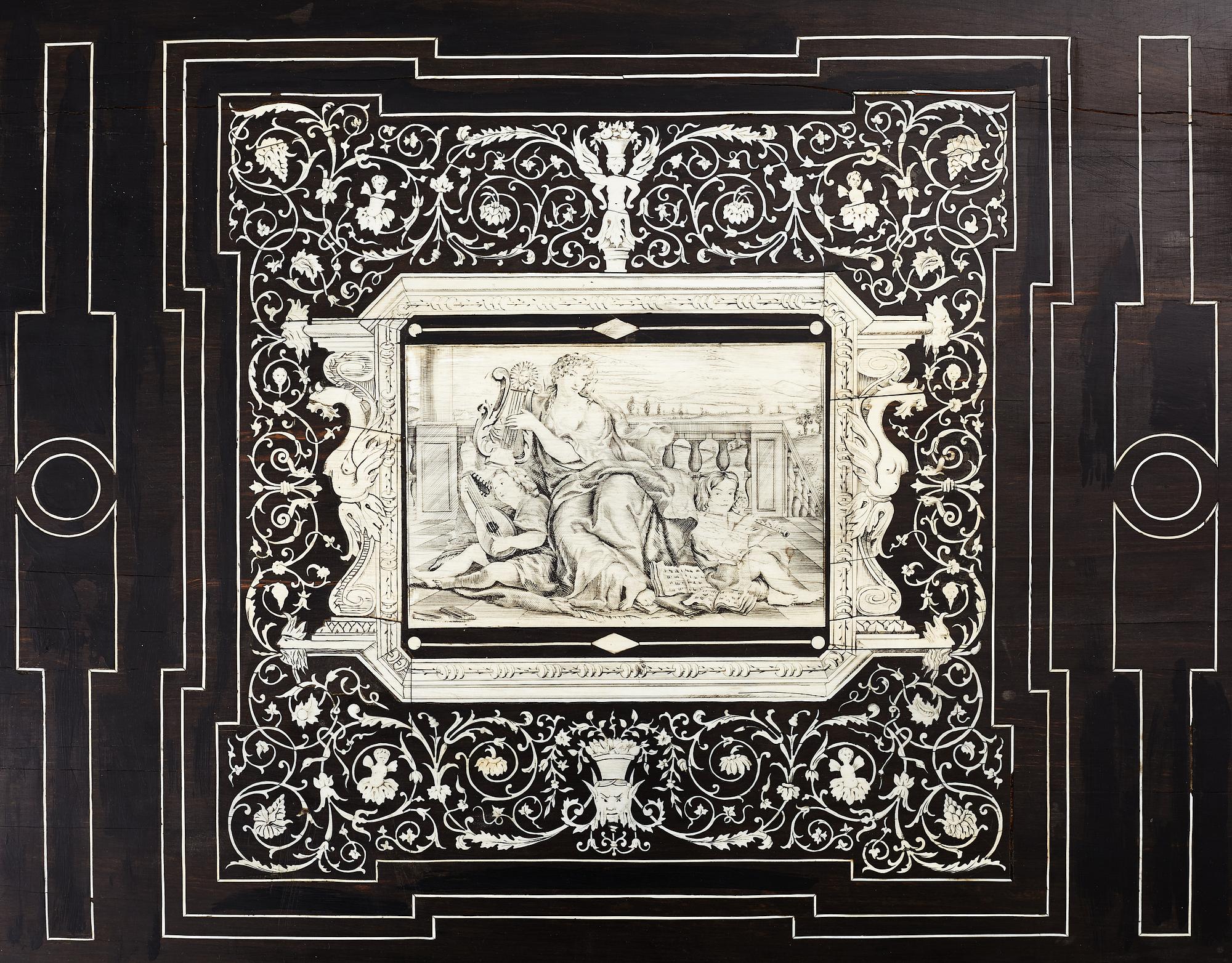 A Renaissance-style ebony, ebonized and ivory-inlaid library table, late 19th century, presumably Germany.