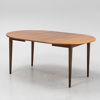 A walnut dining table, 1960's.