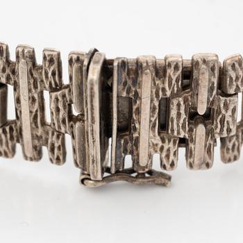 Silver bracelet.