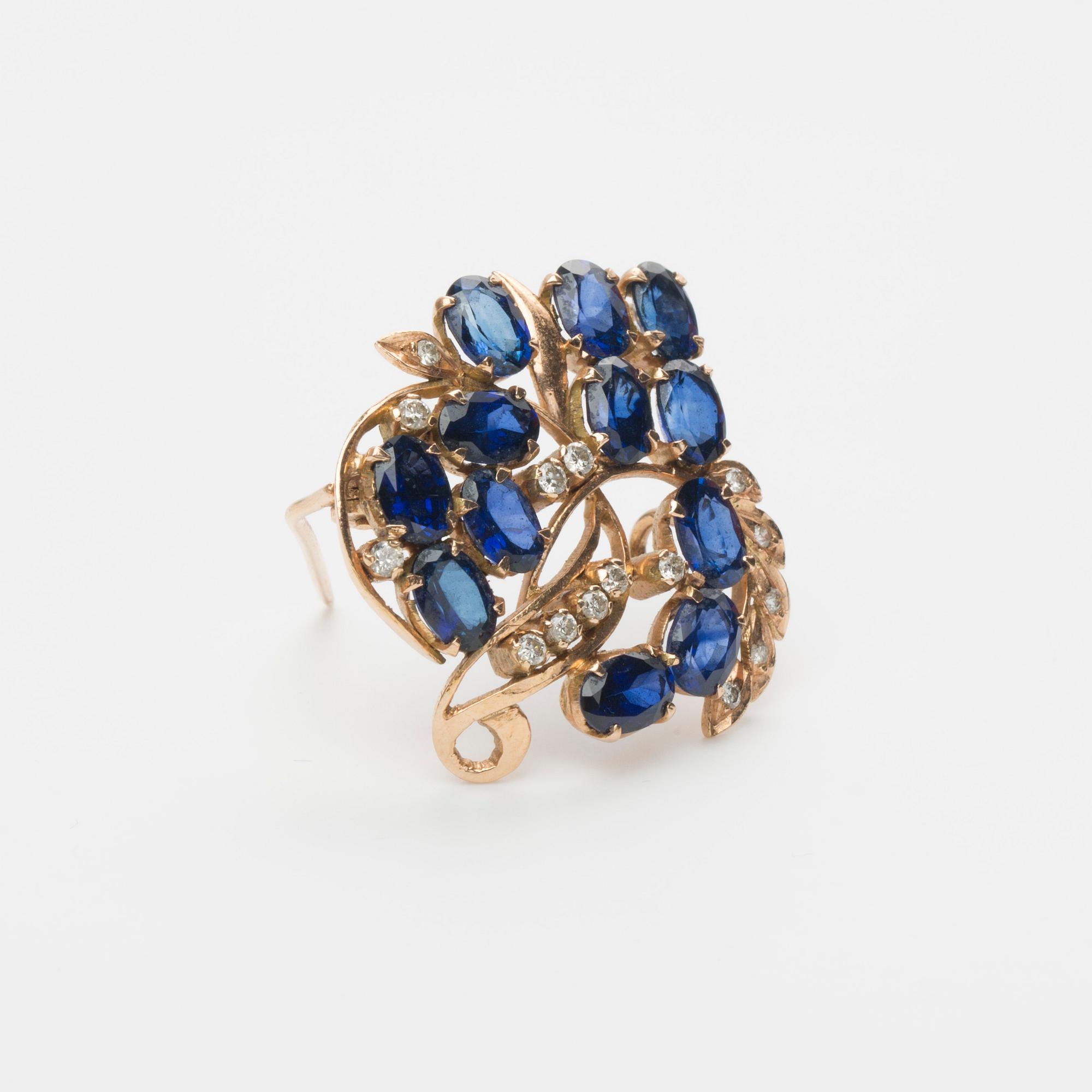 BROSCH/HÄNGE, 14K guld med safirer samt briljantslipade diamanter ca 0.20 ct.