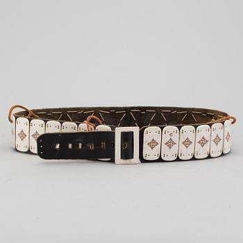 A traditional sami belt probably by Per Anders Nutti. Signed with a monogram.