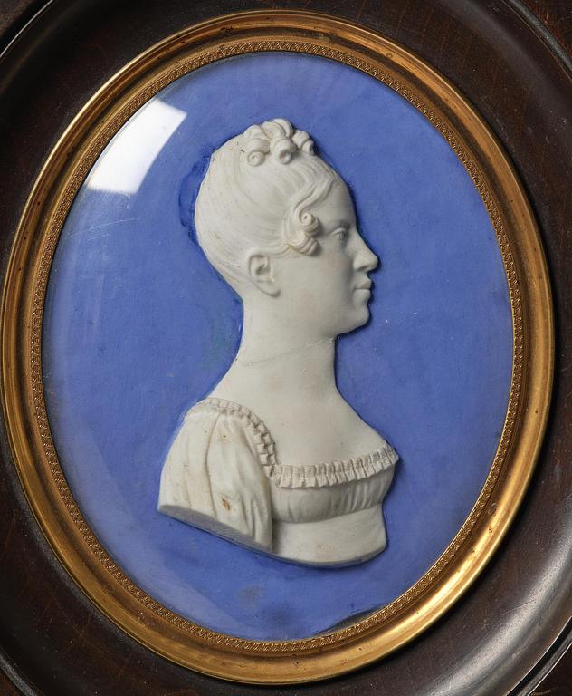 A pair of Sèvres biscuit plaques by Alexandre Brachard (1775-1843), dated 1812.