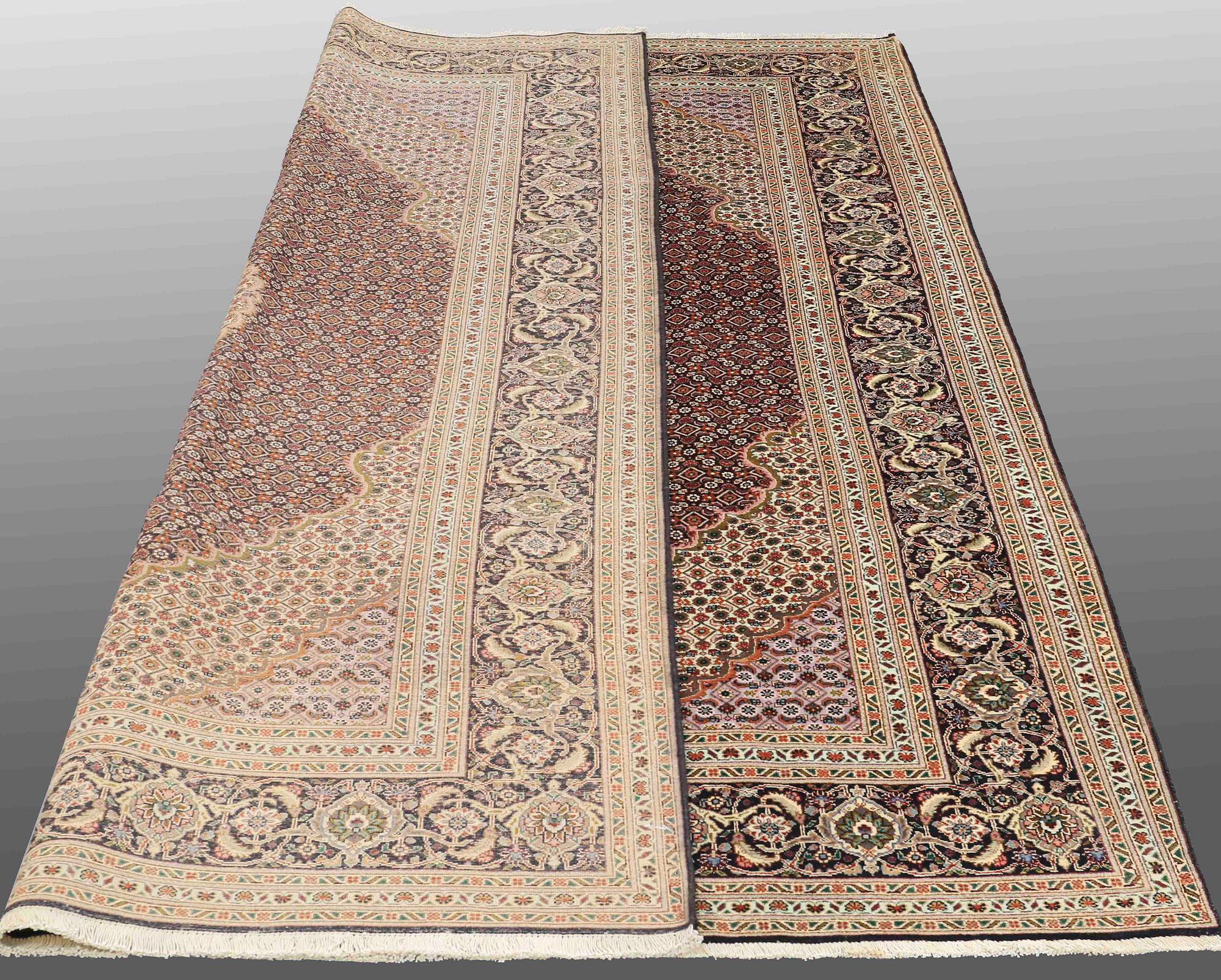 A CARPET, Tabriz part silk , so called 40 Radj, ca 298 x 202 cm.