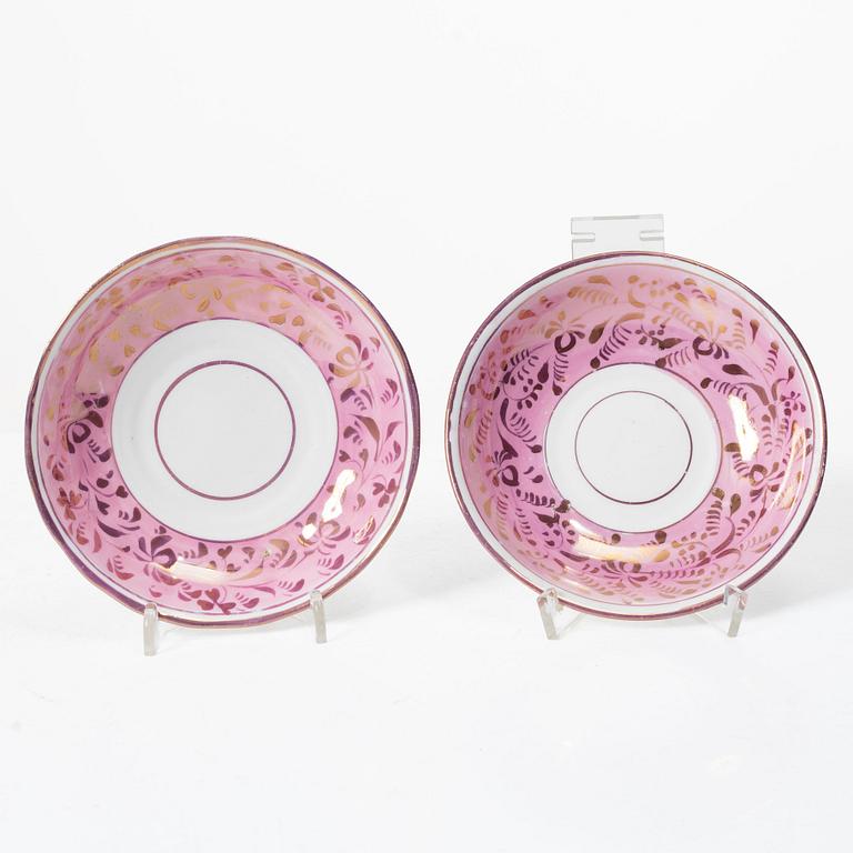 Twelve cups and saucers, England, 19th century.